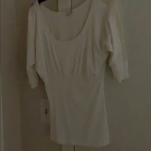 Beautiful top by Guess! Lace insert sleeves